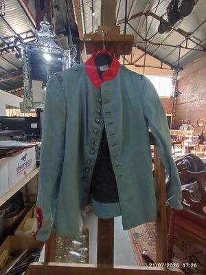 a blue jacket on a mannequin in a shop