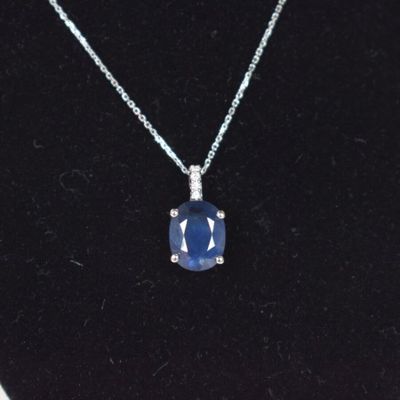 Pendentif et chaîne maille forçat diamantée en or blanc 18K …