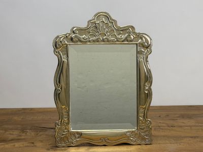 Miroir, cadre en métal argenté de style rocaille.