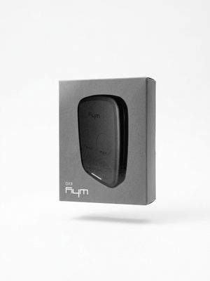 a close up of a black box on a white surface
