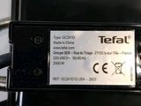 a close up of a black electronic device with a label on it