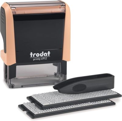 a rubber stamper with a keyboard and mouse on a white background