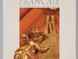 la couverture d'un livre sur laquelle figure une statue en or