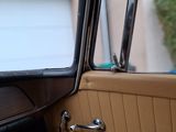 an image of the inside of a car with the door open