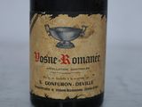 a bottle of wine that is sitting on a table