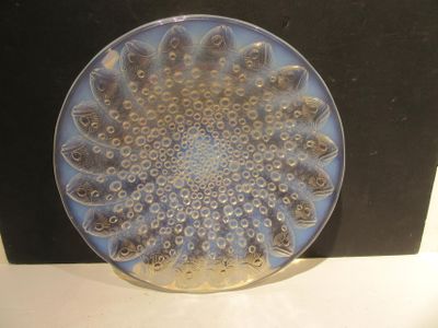a glass plate with a circular design on it