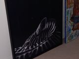 three paintings on the wall of a room next to each other
