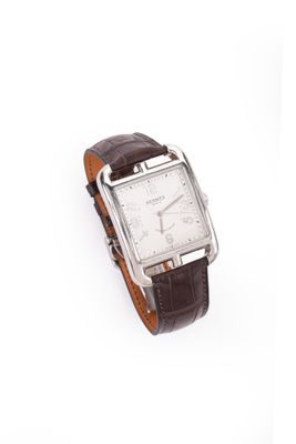 l'image d'une montre-bracelet avec un bracelet en cuir marron