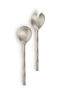 SERVICE A SALADE en métal argenté, les manches stylisant du …