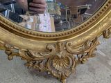 a man that is taking a picture of himself in a mirror