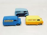 three toy cars that are sitting next to each other