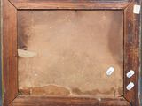 an old picture frame with a piece of paper taped to it