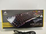 a box with a computer keyboard on it on a table