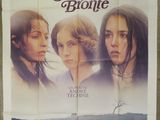 the poster for the movie les sevres broutie is hanging on the wall