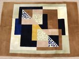 an image of a patchwork quilt with squares and squares