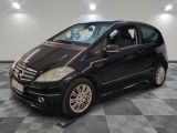 a picture of a black mercedes b - class parked in a garage