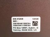 the back of a laptop computer with a sticker on it
