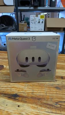 a box that is sitting on a table with a pair of headphones in it