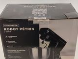 emballage d'un robot Petrin noir et blanc avec un couvercle noir