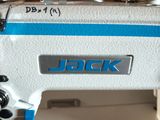 a white sewing machine with a blue stripe on it