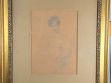 painting of a woman in a gold frame on a blue wall