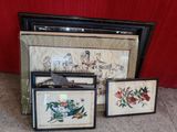 trois tableaux représentant des oiseaux et des fleurs sur fond rouge