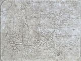 une pierre sur laquelle est dessiné un bateau