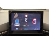 a picture of a car dashboard with a digital display