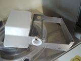 a machine that has a box on top of it