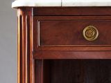 a wooden cabinet with a marble top and a drawer