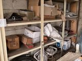 a room with a lot of boxes and boxes on the shelves