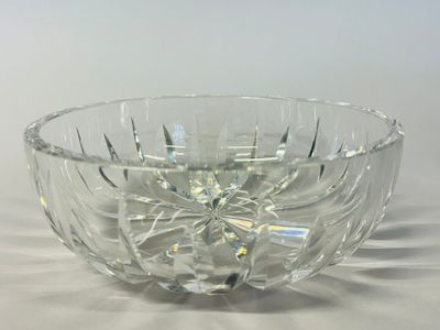 clear glass bowl on a white table with a white background