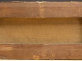 a picture of an old wooden picture frame on a table