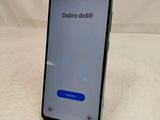 a close up of a cell phone with the dobro dobil button on it