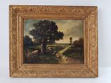 an oil painting of a landscape with sheep and trees in a gold frame