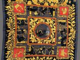 an image of a black and gold scarf with a picture of a horse