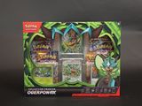 présentation de cartes Pokémon dans un présentoir posé sur une surface noire