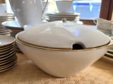 a table with a lot of plates and bowls on it