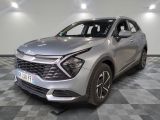 the silver car is parked in the showroom on the checkered floor
