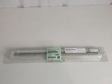 the back end of a glass tube with a label on it