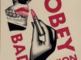 an image of a poster with a woman putting lipstick on her lips