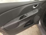 the door of a car with the driver ' s side door open