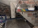 a laptop computer sitting on top of a table in a room