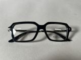 glasses on a table with a white surface and a white background