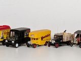 a lot of toy trains that are lined up in a row