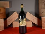 a bottle of wine that is sitting on a table