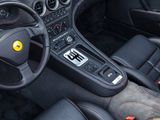 the interior of a sports car with a steering wheel and dashboard