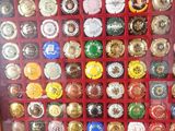 a picture of a picture of a display case filled with different types of buttons
