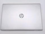 a laptop that is sitting on a white table