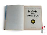 an open book with a picture of a crab on it ' s cover